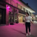 neon-glow-quiet-sidewalk-walk