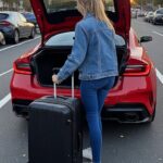 packing-suitcase-red-supercar