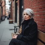 wooden-bench-red-brick-silver-hair